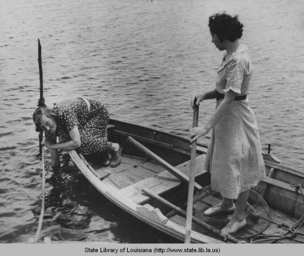 circa 1940s "Acadians searching for crabs" (State Library of Louisiana)