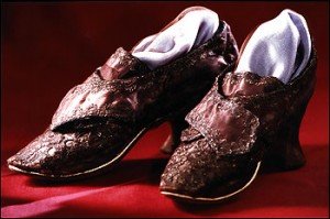 When she married Colonel George Washington on January 6, 1759, Martha Dandridge Custis is said to have worn a "petticoat of white silk interwoven with silver," a gown of "deep yellow brocade with rich lace in the neck and sleeves," and these lavishly embellished shoes of "purple satin with silver trimmings."